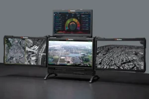 Deployable multi-screen display system with three folding anti-glare monitors for command center operations